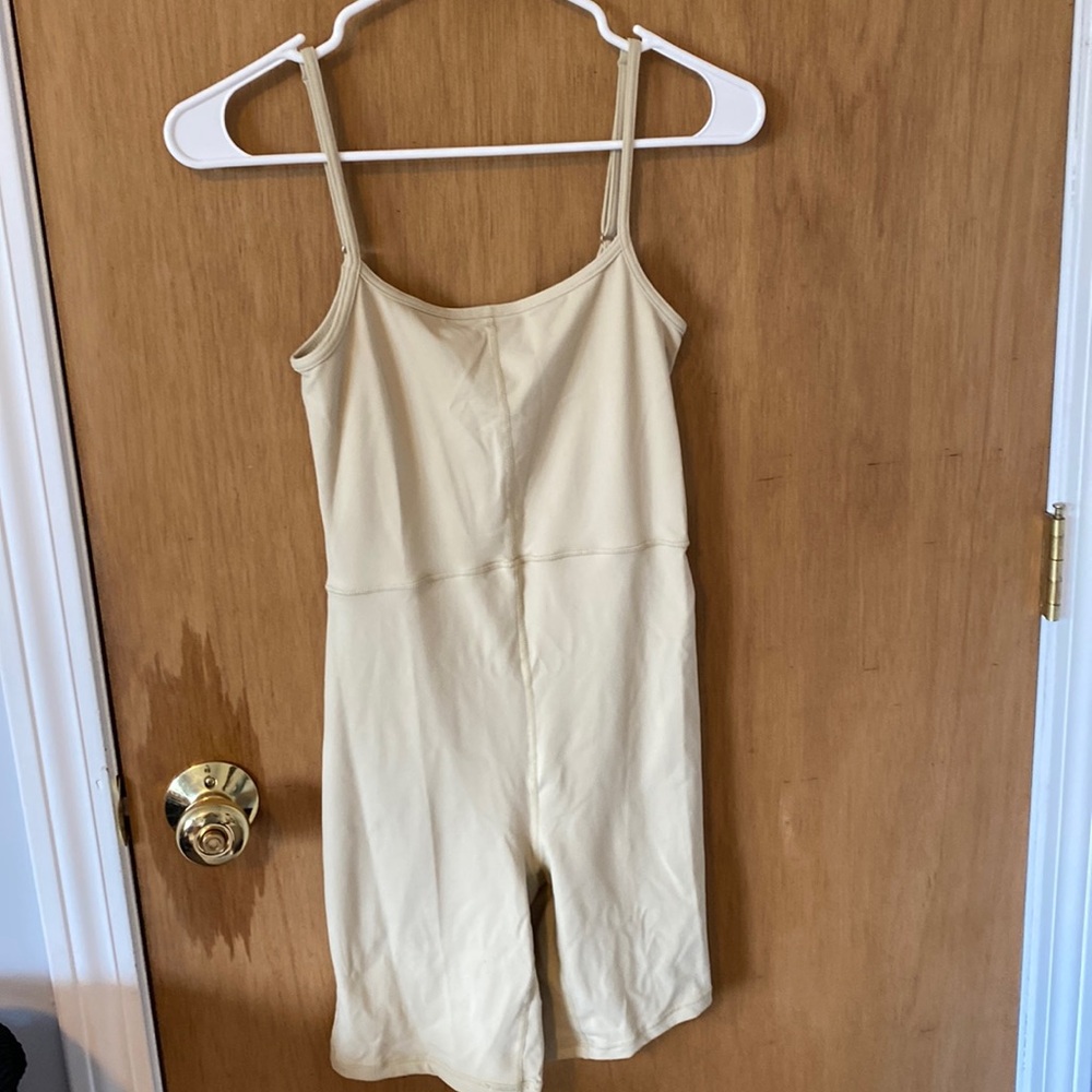 Cream workout romper or jumper size small